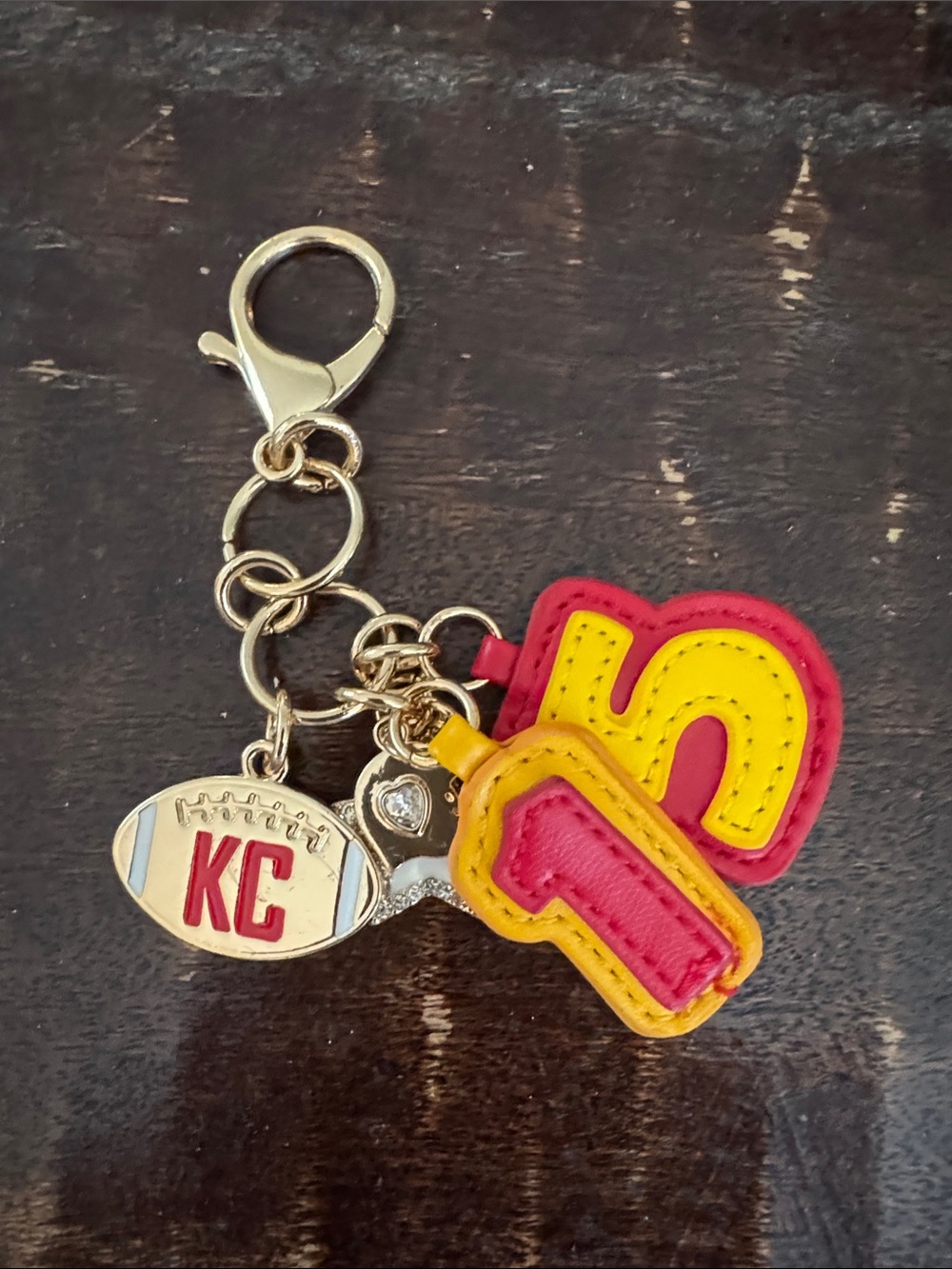 Anthropologie Gold Hardware Football Keychain with Pink & Yellow Patches